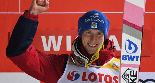 Евгений Климов впервые в истории выиграл этап Кубка мира по прыжкам на лыжах с трамплина